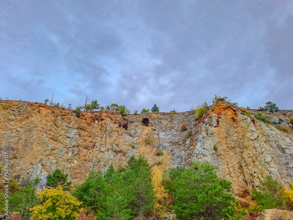 Beautiful view of mountains and rocks on an autumn day near a Konepruske Caves,