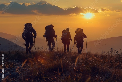 A group of people with backpacks hiking up a hill. Ideal for outdoor and adventure concepts