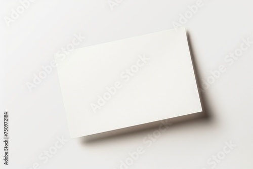 A simple image of a white paper on a table. Suitable for various projects © Fotograf