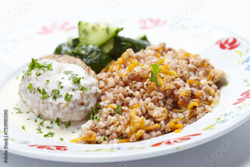 buckwheat with cutlet and sauce