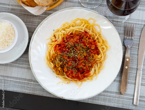 Traditional dish of Italian cuisine is spaghetti bolognese, made from pasta with tomato sauce based on minced meat