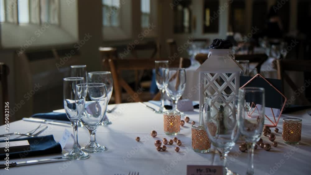 Venue banquet table set up served dinner tableware and silverware on wedding event. Move camera footage. Close up Venue banquet table set up served dinner tableware and silverware on wedding event. Move camera footage. Close up