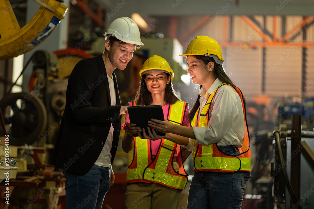 professional engineer,worker,technician use clipboard discuss work, walk in steel metal manufacture factory plant industry. Black African American man and woman wear hard hat check quality machine professional engineer,worker,technician use clipboard discuss work, walk in steel metal manufacture factory plant industry. Black African American man and woman wear hard hat check quality machine