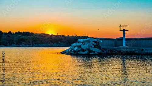 sunset in sea marina of Chernomorets, Bulgaria photo