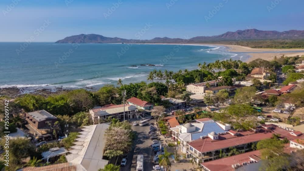 Daytime town of Tamarindo in Costa Rica Hyperlapse aerial with ocean and town skyline Daytime town of Tamarindo in Costa Rica Hyperlapse aerial with ocean and town skyline