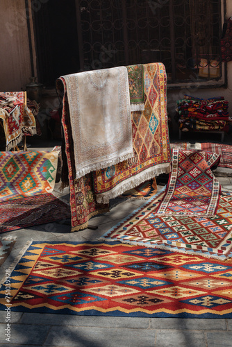 Beautiful multi-colored carpets laid out in the sun
