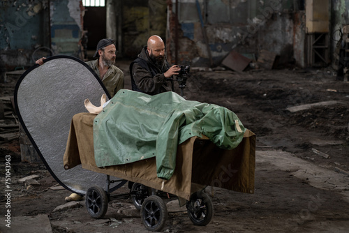 cameraman and assistant working on horror filming