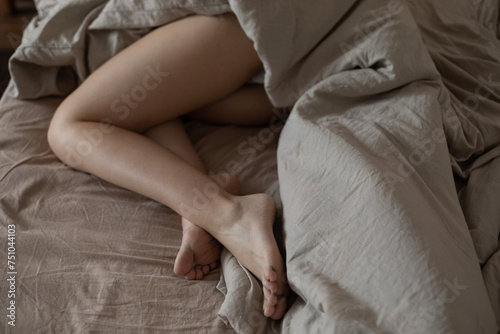 woman's bare legs photo