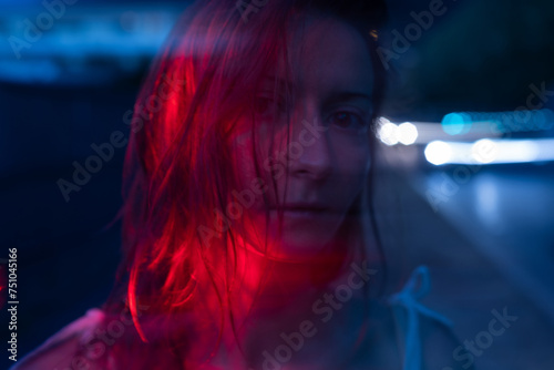 resentment, night portrait of tired sad woman looking at camera