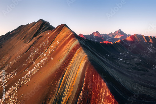 Rainbow mountain and red valley in the Peruvian highlands. photo