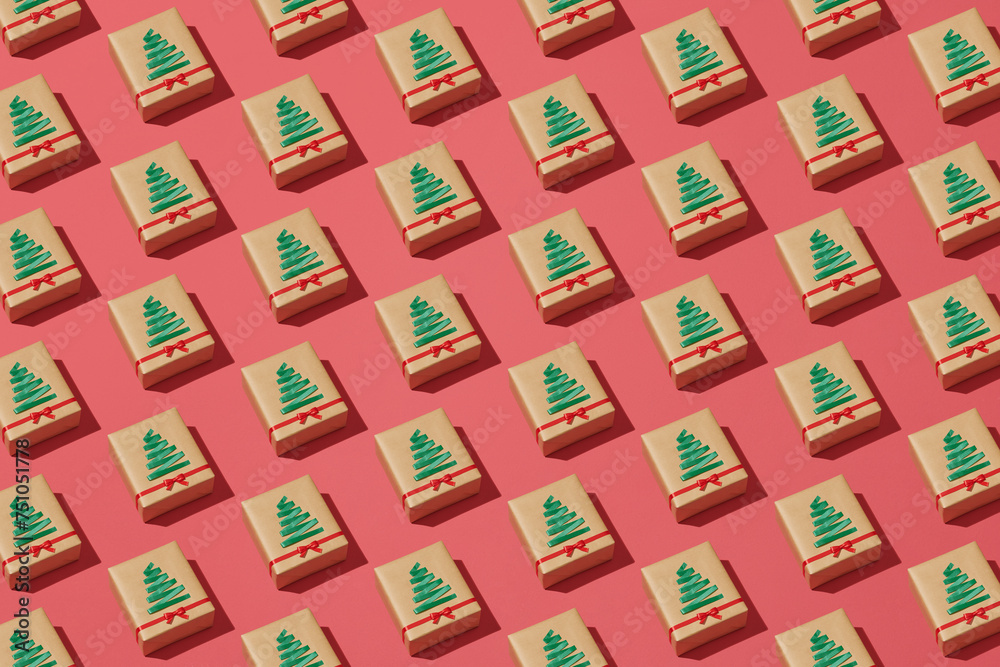 Repetitive pattern of Christmas gift boxes wrapped in craft paper Repetitive pattern of Christmas gift boxes wrapped in craft paper