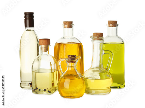Vegetable fats. Glassware of different cooking oils isolated on white