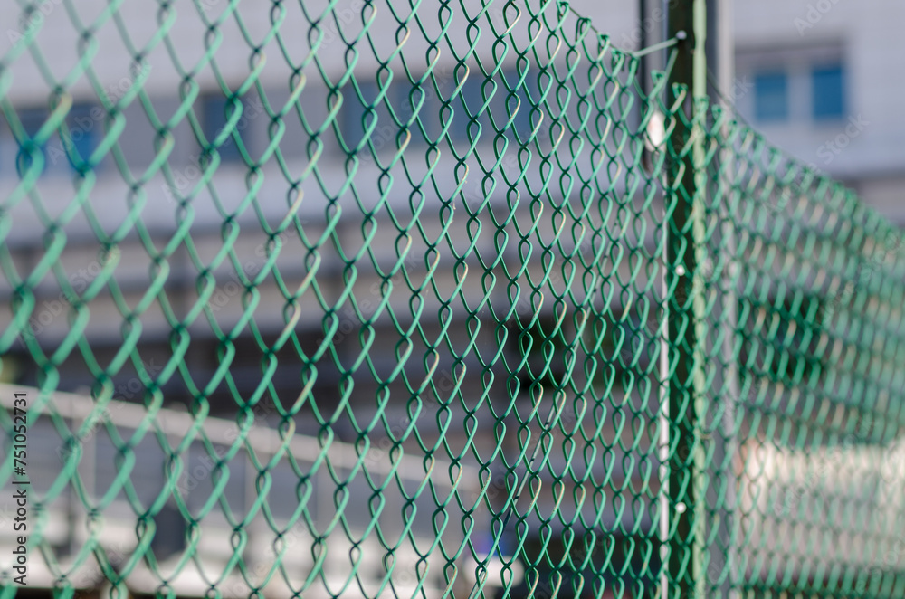 metal fence made of plastic with steel wire, net stretched to protect the boundaries of the property. news on immigration and the increasingly risky borders to cross due to the increase in controls. metal fence made of plastic with steel wire, net stretched to protect the boundaries of the property. news on immigration and the increasingly risky borders to cross due to the increase in controls.