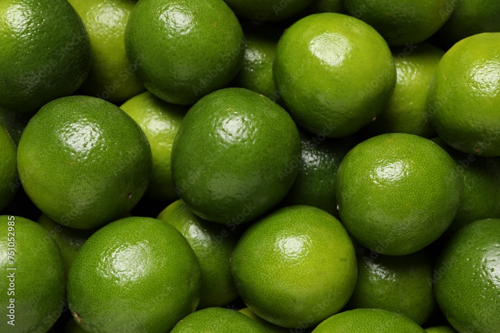 Many fresh ripe limes as background, top view Many fresh ripe limes as background, top view