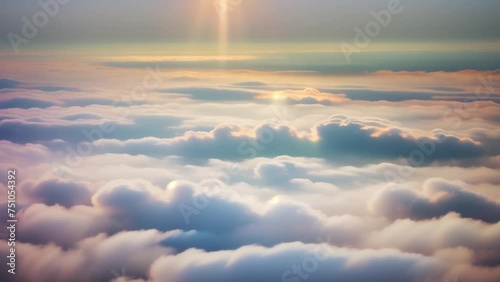 Above the clouds, sunrise unveils a breathtaking tapestry of blue and gold. Atmosphere concept. Nature stock footage. Timelapse. Sky background.
