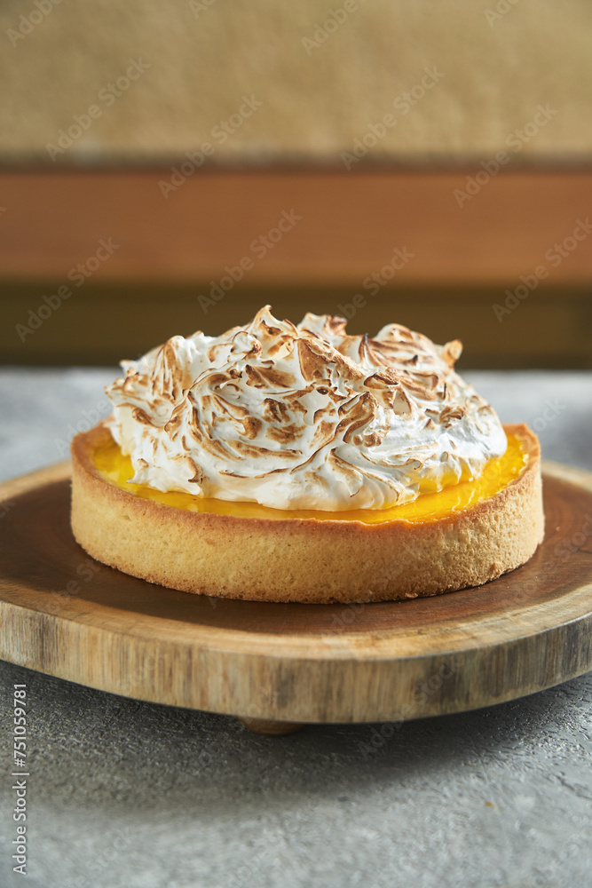Lemon custard cake on grey background Lemon custard cake on grey background