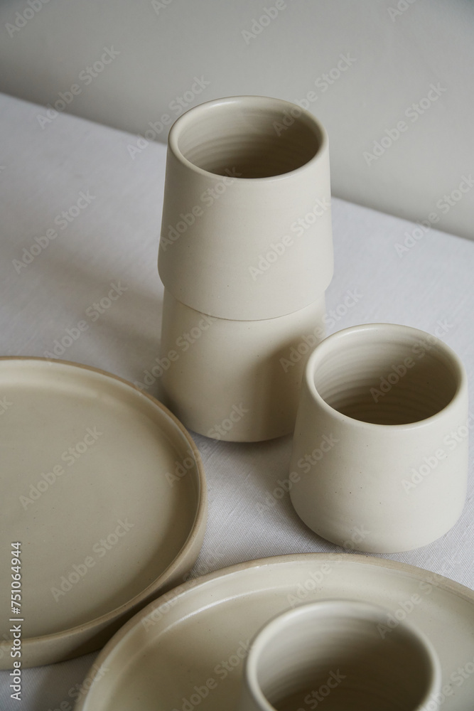 Artisanal Ceramic Mug Trio and Plates
