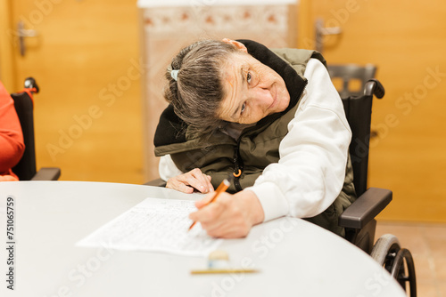 A disabled woman in a residential care facility photo