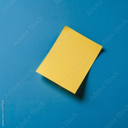 Yellow Post-it Note on Blue Background