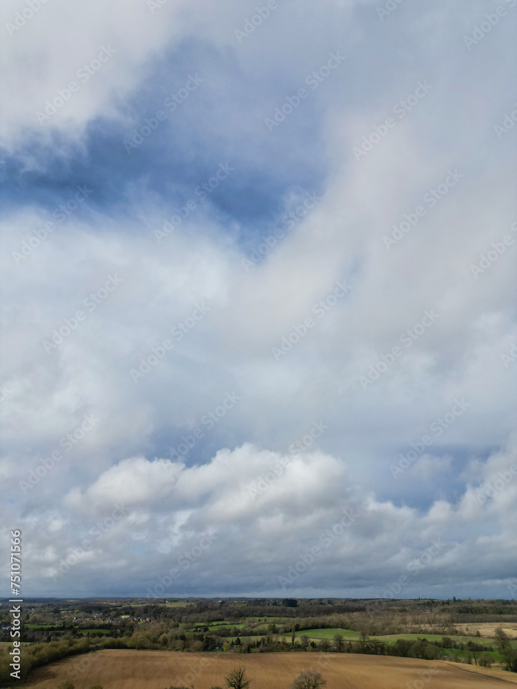 High Angle View of Dramatical Clouds over Countryside of England UK High Angle View of Dramatical Clouds over Countryside of England UK