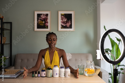 Blogger advertising essential oils and supplements photo
