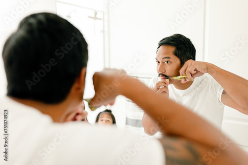 Man shaves mustache photo