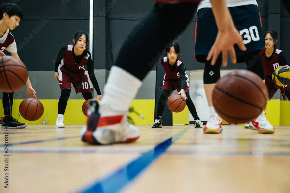 Basketball team doing drills at practice Basketball team doing drills at practice
