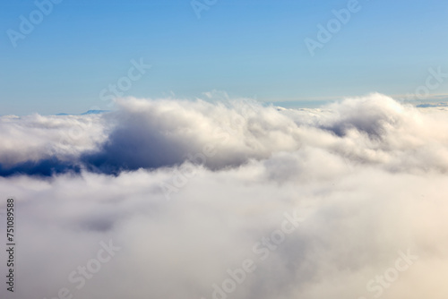 Low clouds as seen from a top of the mountain.