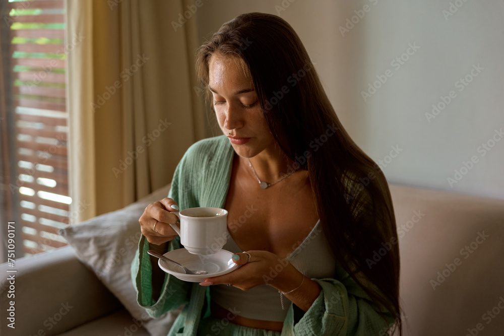 woman with diabetes takes a finger blood test and does a routine home woman with diabetes takes a finger blood test and does a routine home