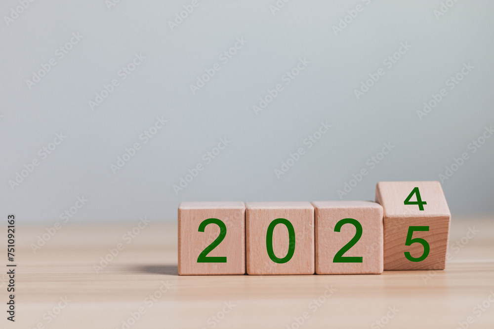 2025 growth business. wooden block with 2024 change to 2025, Set up