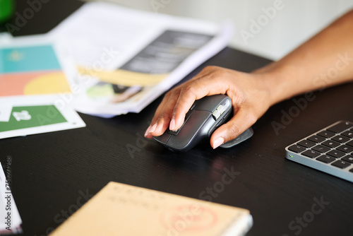 Worker use mouse scroll wheel  photo