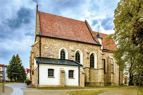 Obraz na płótnie Catholic Cathedral in Jaslo, Poland. A Catholic church is a religious building that serves as a gathering place for believers to read prayers. w salonie