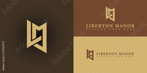Abstract initial letter LM or ML logo in gold color isolated in multiple brown background colors applied for boutique hotel logo also suitable for the brands or companies have initial name ML or LM. photo