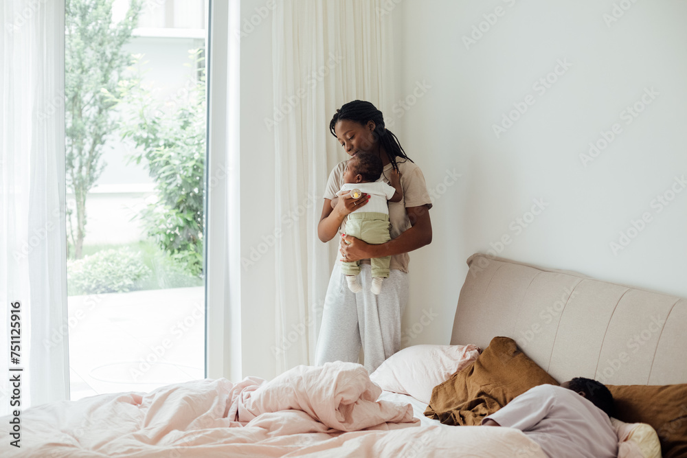 Woman Holding Newborn Baby Boy Woman Holding Newborn Baby Boy