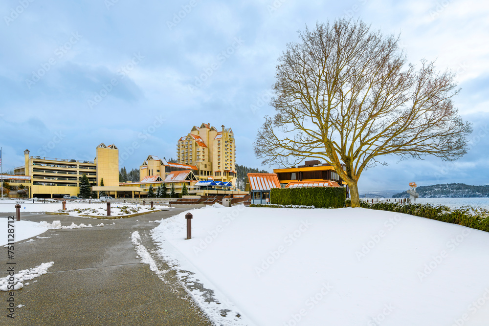 The resort downtown district along the lake in the North Idaho Panhandle city of Coeur d'Alene, Idaho USA, with snow on the ground at winter.