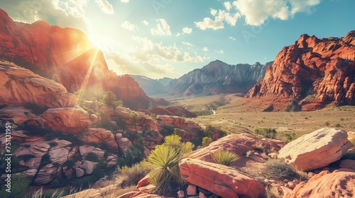 Panoramic landscape view of beautiful red rock canyon formations during a vibrant sunny day