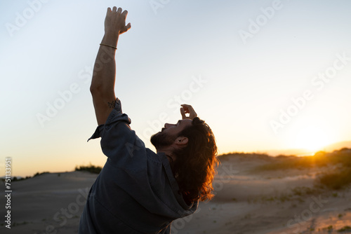 Man Dancing At Sunset photo