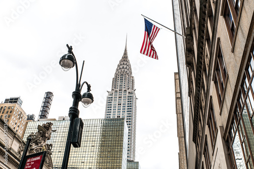 Waving American flag against famous building
