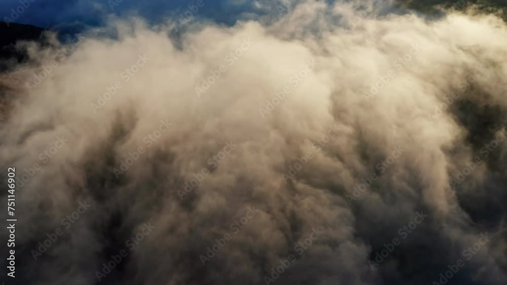 Billowing clouds of smoke against a blue sky, dynamic and dramatic scene Billowing clouds of smoke against a blue sky, dynamic and dramatic scene