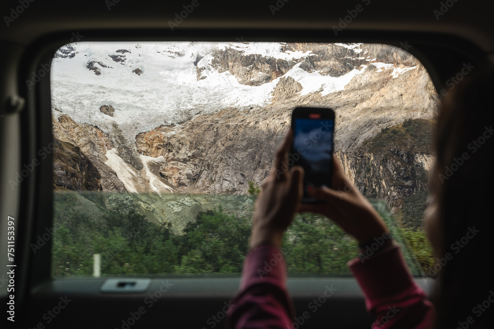© Luis Herrera/Stocksy - Woman Capturing Memories of Vacation Road Trip with Smartphone © Luis Herrera/Stocksy - Woman Capturing Memories of Vacation Road Trip with Smartphone