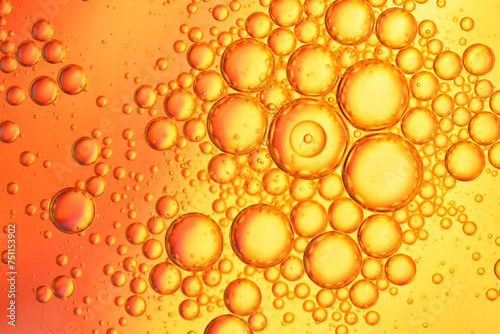 Red And Orange Oil Drops On Water Surface   photo