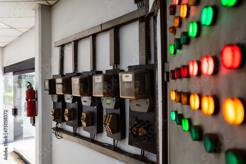 Old kWh meter circuit arrangement inside a building photo