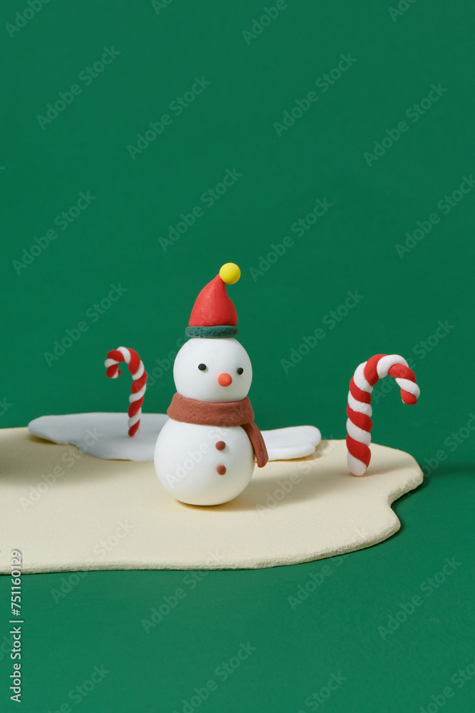 Merry Christmas and Happy New Year with snowman and candy cane Merry Christmas and Happy New Year with snowman and candy cane