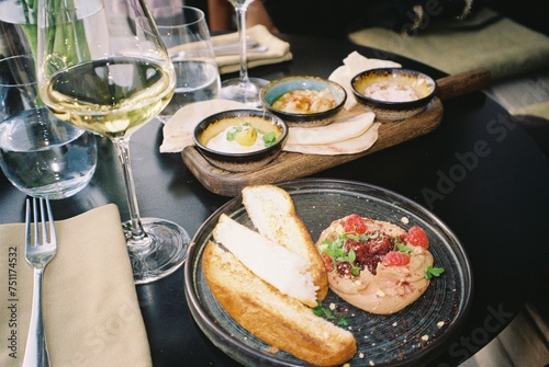 Snacks for white wine in an outdoor restaurant in summer  photo