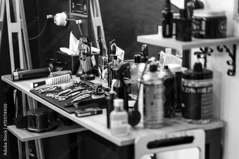 Barbers tools for mens haircuts laid out on a table Barbers tools for mens haircuts laid out on a table