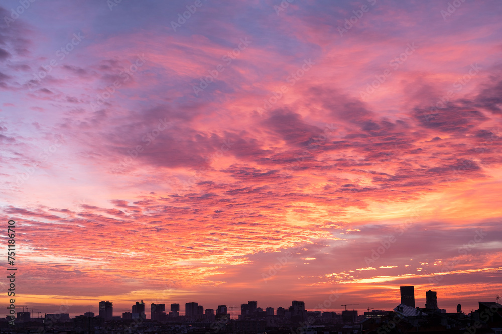 Fototapeta premium Spectacular sunrise with reddish tones of the city of Barcelona (SPAIN)
