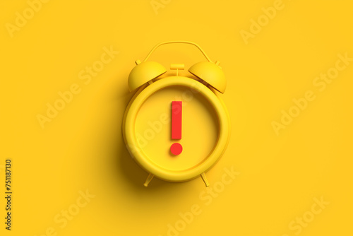 Yellow alarm clock with exclamation mark on background.