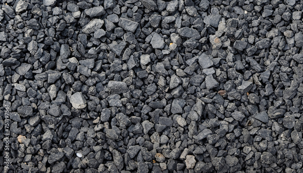 Black gravel. Dark crushed stones background. a little used, it is Black gravel. Dark crushed stones background. a little used, it is