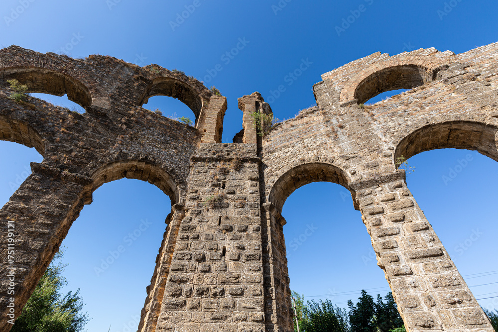 Ruins of roman aqueduct in ancient city Aspendos