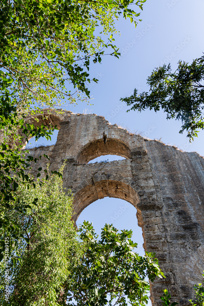 Ruins of roman aqueduct in ancient city Aspendos